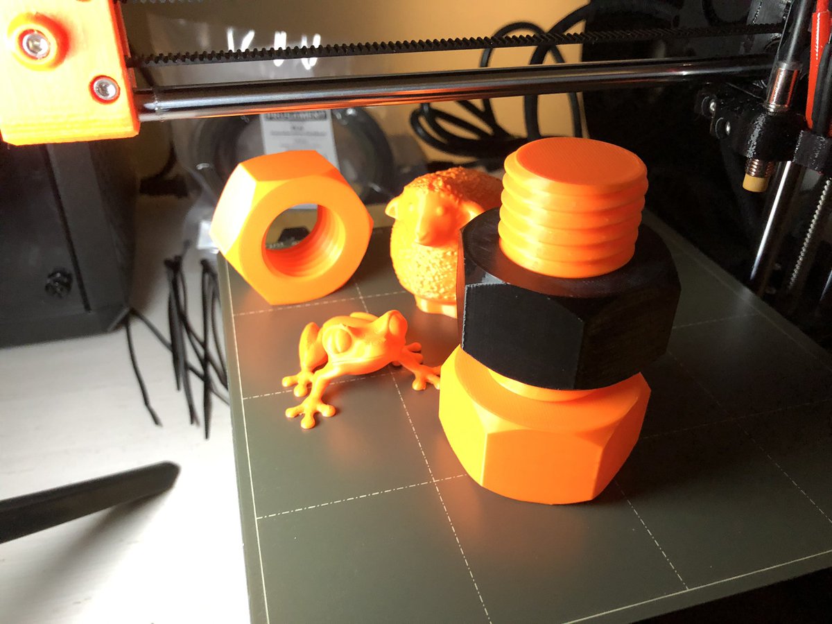 So! Resliced the nut model for PETG and it printed great! So all PETG all the time now! It also fits the PLA screw really well. (I also printed a frog and a sheep because fuck it, why not?)