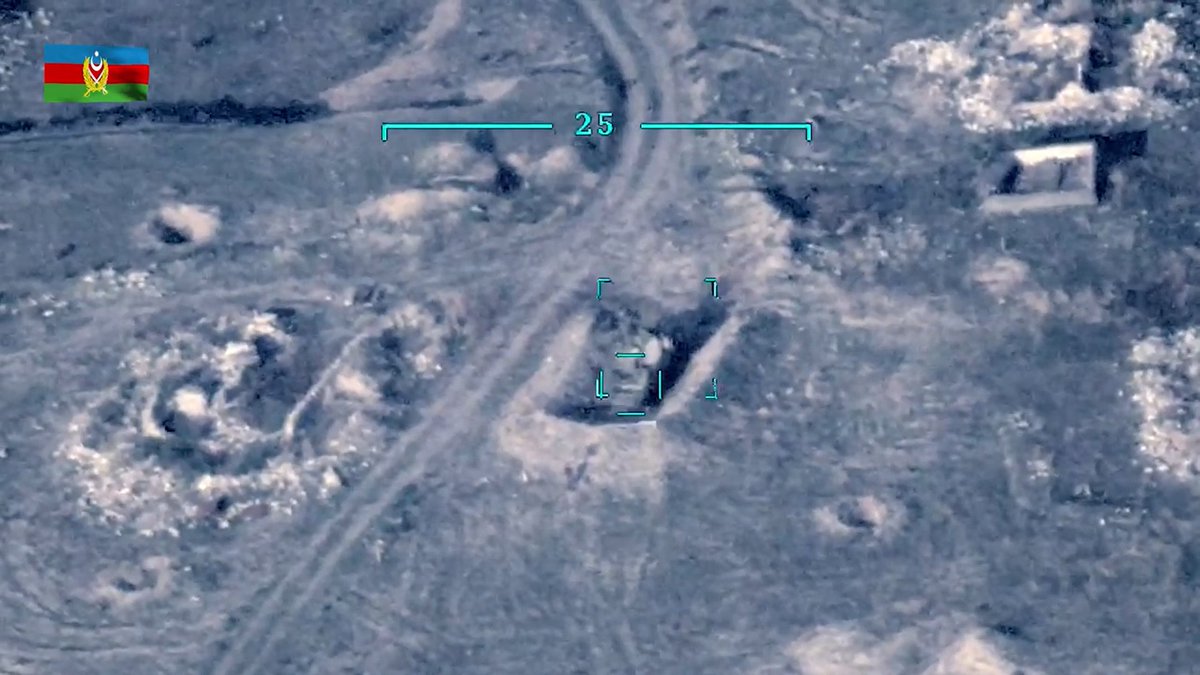 They look like Osa air defense systems. Azerbaijan previously claimed that they destroyed 12 Armenian Osa AD systems today. It looks like 3 of them were damaged or destroyed here, possibly by MAM-L munitions. 155/
