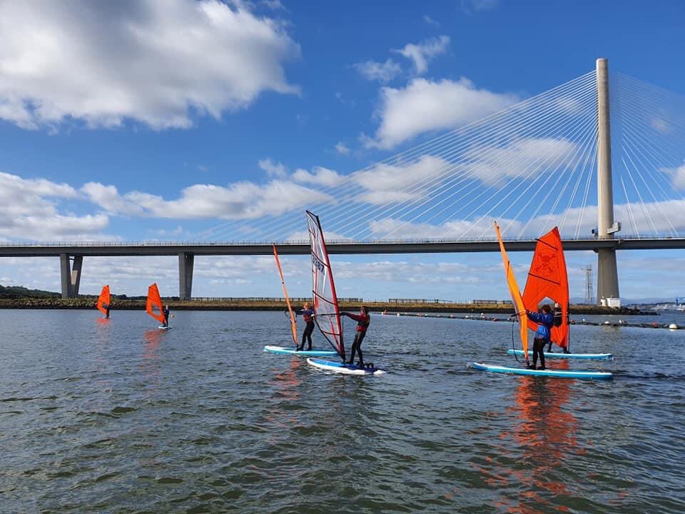 PEWatersports's tweet photo. What a location! Port Edgar Pirates Team 15 take to the high seas once again!! ☠️☠️Garrr☠️☠️ #Team15 #windsurf #ryaScotland https://t.co/LflxE3JOuF