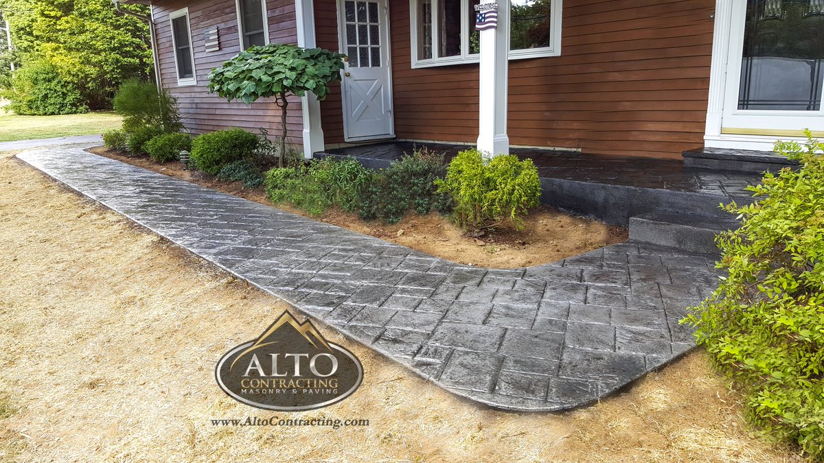 Here's a new stamped concrete walkway that replaced a boring broom finished concrete walkway.

Altocontracting.com
(914) 734-9739

#stampedconcrete #stainedconcrete #decorativeconcrete #concrete #masonry #westchester #westchestercounty #paver #hardscape #patio #walkway #steps