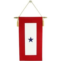 This banner or vehicle sticker, with a BLUE star, denotes a family member, usually a spouse or child, currently serving in a war abroad /3