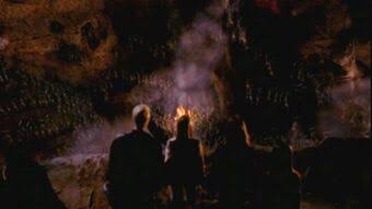 5. A supernatural 'pit' likened to Hell that contains/leads to another dimension. Attracts and/or expels monsters from itself to complete tasks. Source of conflict for protagonist and main cast.