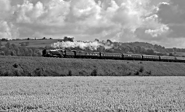 18/ and the hamlet of Woolfont Parva, now threatening to grow larger than Magna with the HQ, shop, and yards of the restored steam Woolfonts & Chickmarsh Railway (shown: No. 1021 Earl of Maynooth down train to Gillingham Peacemarsh)