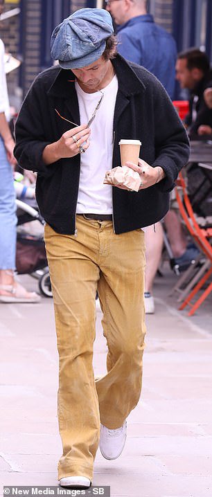 jul 31 2019: harry out and about in london in these iconic yellow bell bottoms and of course the white vans. still looking pristine