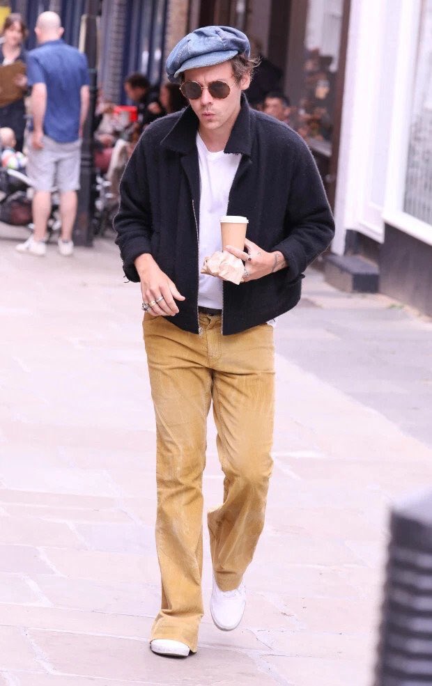 jul 31 2019: harry out and about in london in these iconic yellow bell bottoms and of course the white vans. still looking pristine
