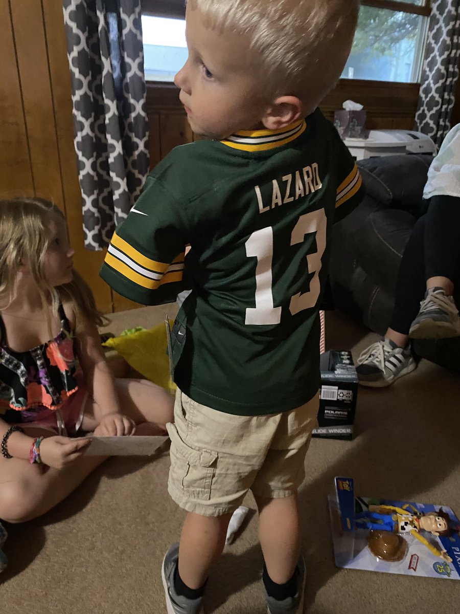JordanAshley_23's tweet photo. Go💛Pack💚Go🏈 Bronson’s loving his Lazard jersey from @Moore_54 and @el_moore_el !! @AllenLazard  #GoPackGo https://t.co/y47L0Aujg1