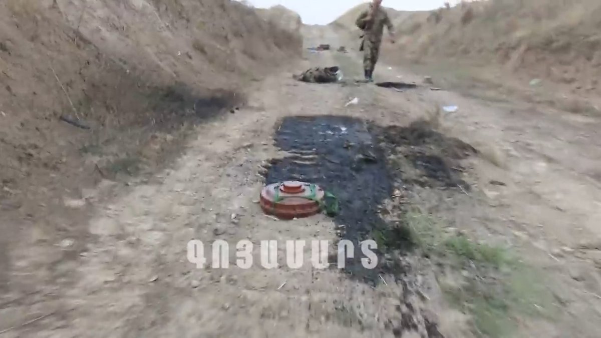 Look's like a TM-62P2 anti-tank mine and a pair of RPG-7. 187/