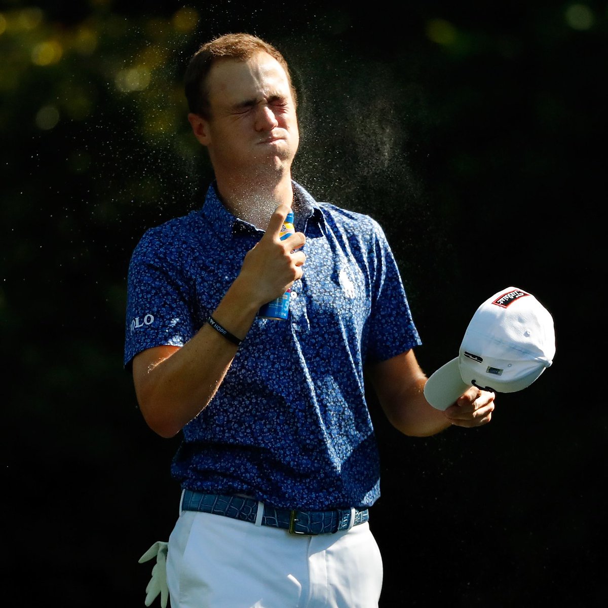 GOLF_com's tweet photo. JT vs. sunscreen spray https://t.co/Xo0Yq7v0ir