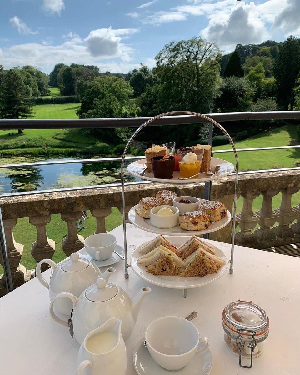 Satisfy your sweet tooth with an afternoon tea at Cowley Manor; the glorious Cotswold view is the cherry on top. Visit our website to make your booking: cowleymanor.com 📷: instagram.com/oxfordshirehome