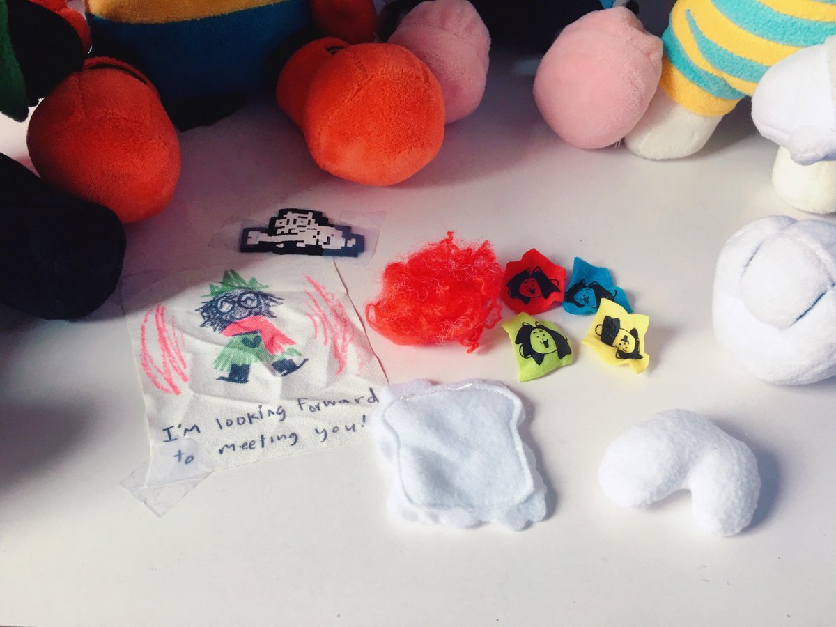 the other cool (and morbid) fact i love is that every plush has something hidden inside of it if you cut it open. toriel has a monster soul, papyrus has a patch of the dog holding a bone, sans has red stuffing, temmie has temmie flakes and ralsei has his note!