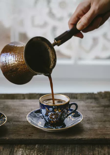 Served in smaller cups, this coffee is is one of the most aromatic beverages.On a small vessel, Coffee bean is boiled for hours on a low flame. Cardamom and sugar is added during the preparation itself. The coffee has a thicker consistency when served. (2/3)