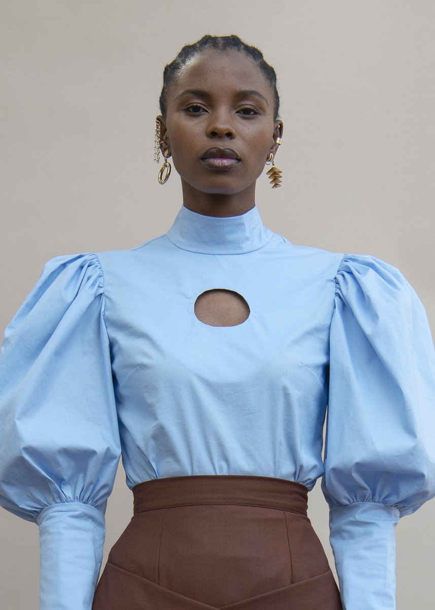IMBOKODO 21. Mushroom sleeve cotton blouse and Crisscross tie skirt. 

Available for pre-order.

For international pre-order @thefolklore

Photography @tatendachidora
Stylist &amp; art direction @chloe_andrea_the_creator
MUA &amp; Hair @bassie_makeupartist
Muse @iam_conniemore