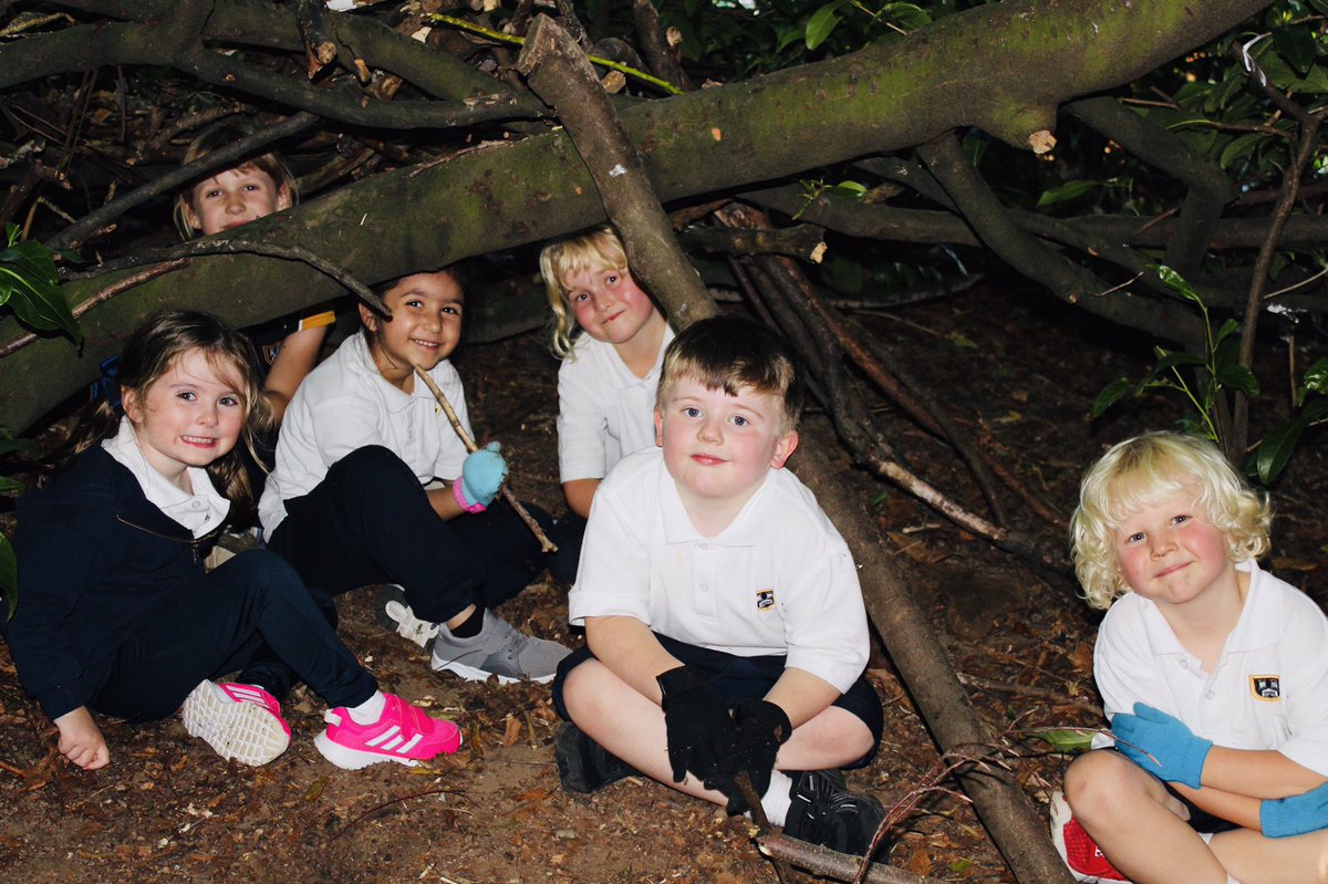 BedstoneCollege's tweet photo. Mrs Martin &amp; Mr Lynch are being supported by members of the Junior School as they go Head-to-(Deputy)Head in a den-building competition over the next few weeks.

This week’s mission was to find suitable branches &amp; to start work on a design that will keep the entire team dry ☔️ https://t.co/6i2srWPVx2