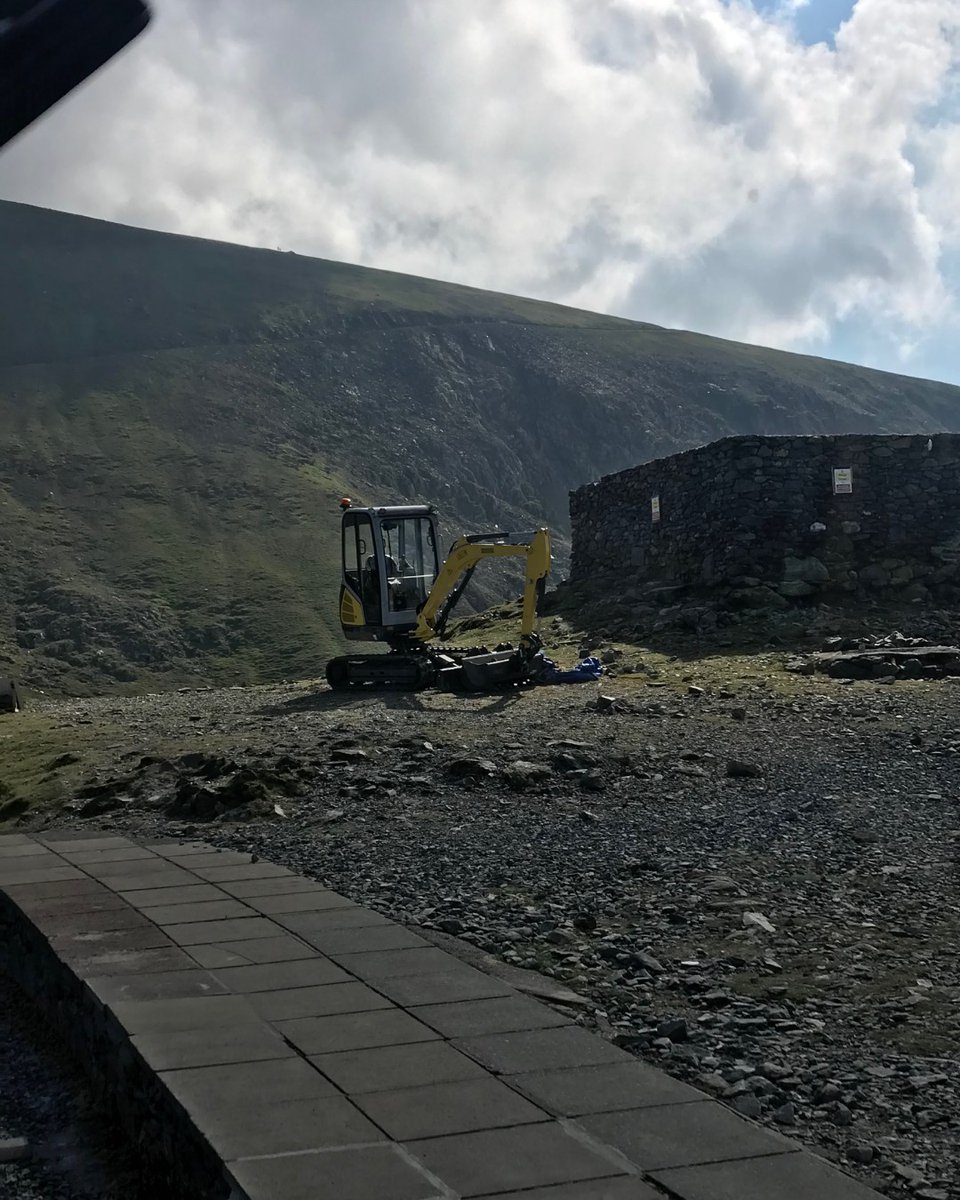 HUSKISSONLTD's tweet photo. A Great days work clearing the paths and walk ways of the Beautiful Snowdonia National Park Mountain. Rob Davies is very pleased with his new purchase from Huskisson of his Wacker Neuson ET24 compact Excavator with a Vertical Digging System keeping him level even on those slopes. https://t.co/eHPzoLZ8cv