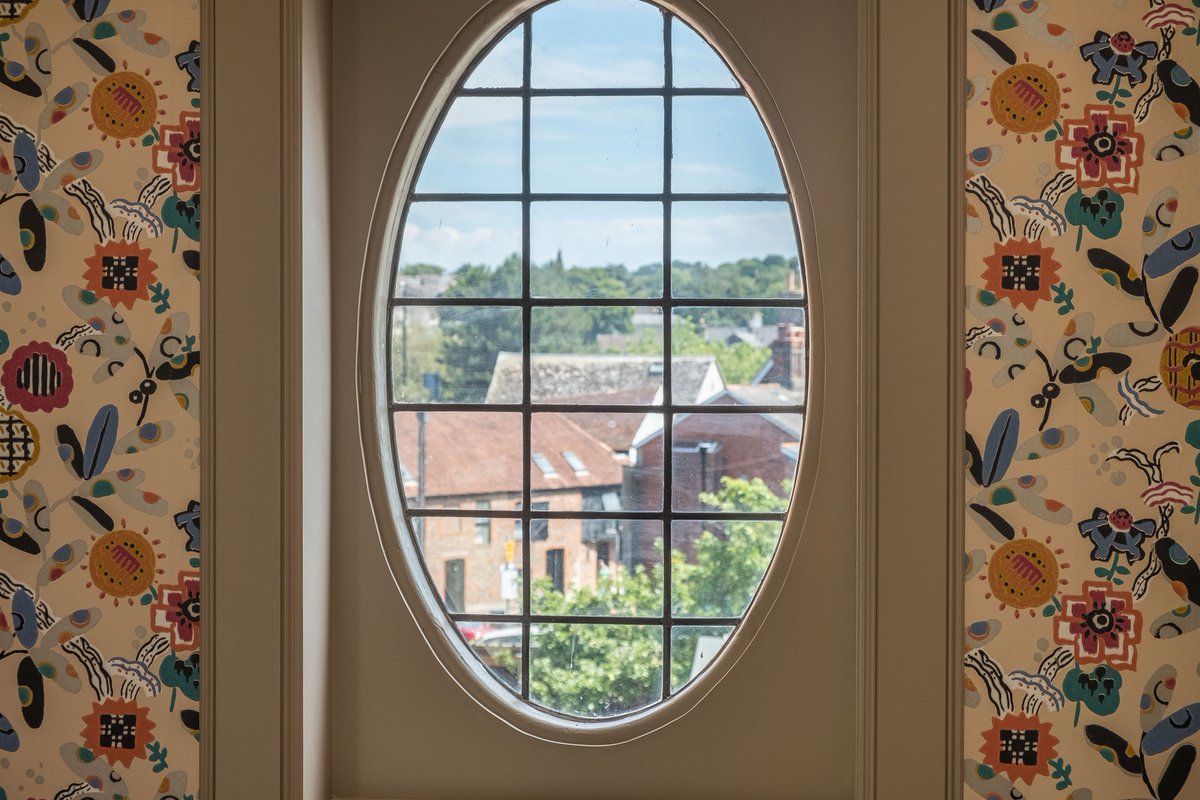 Our pretty oval window overlooking the rooftops in the town of Newport. One Holyrood is an independently owned, intimate boutique hotel, licensed cafe, and gardens on the Isle of Wight.

Call 01983 521717 for our best deals. 
oneholyrood.co.uk

#isleofwight #boutiquehotel