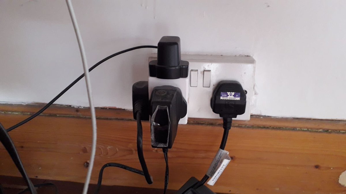 Geoffoff's tweet image. After comparing notes on pandemic home-working set-ups with @cg__, we conclude that more entertaining/revealing is the resultant #plugsocket situation.

The state of these. Can you do better/worse?