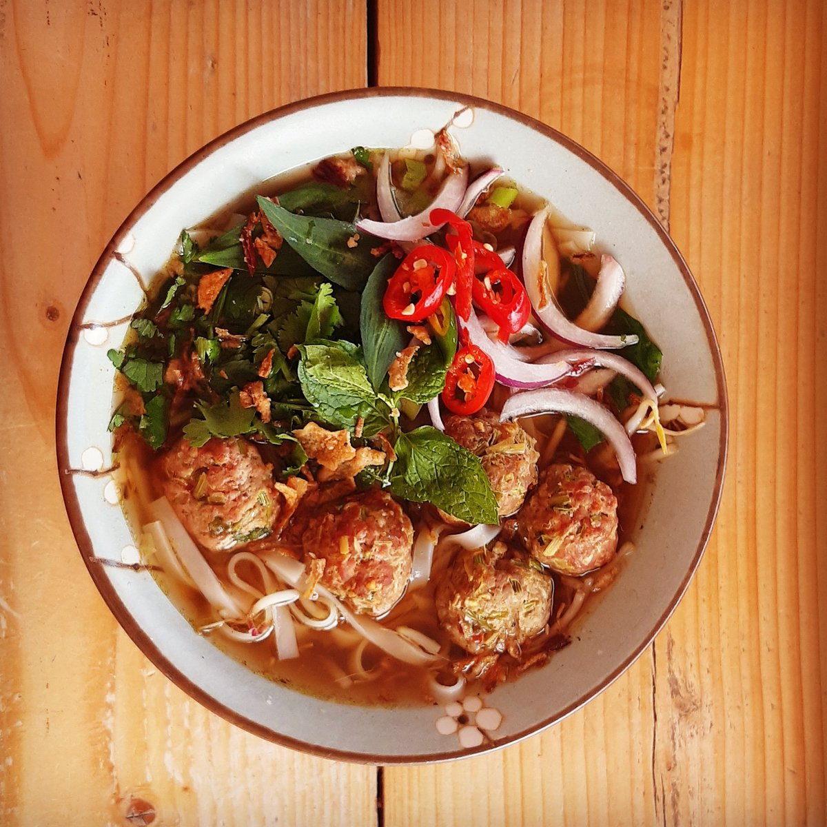 pestlemortar7's tweet photo. Chef Sushada was feeling homesick so she decided to recreate her dad's spicy Shan meatball recipe, served here in a pho style noodle soup #noodles #noodlesoup #pho #meatballs #beef #freerangebeef #homemade #vietnamese #thai #shan #asianfood #asianfusion #pestleandmortarlewes https://t.co/wytVQjo7BQ