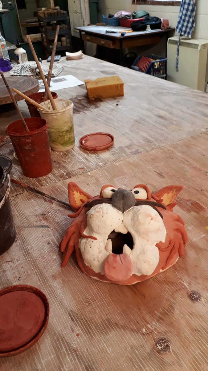 Glazing my cat wallhanger.