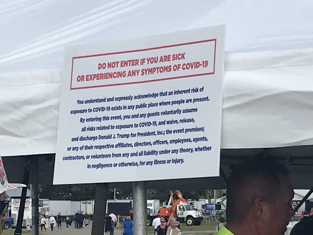 On the way in, a sign displays a COVID symptom warning & a small supply of hand sanitizer is available.However, mask wearing is somewhere between 15-20% and the queue line is not spaced.