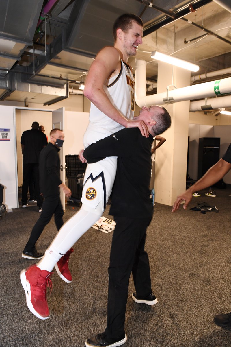 my new favorite thing is the Denver Nuggets coach picking Nikola Jokić, his seven-foot center, just RIGHT UP OFF THE GROUND