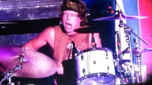 ashton irwin and his drumming face, a thread;