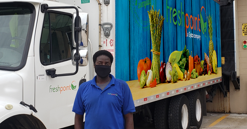 FreshPointInc's tweet photo. Reggie has been with our FreshPoint Family for over 9 years and is a valuable asset to the team.  Thank you Reggie for all you do! It's National Truck Driver Appreciation Week this week: remember to #ThankADriver today! 🚚 💚 🧡 🚚 #PeoplePassionProduce #mysyscotruck #freshpoint https://t.co/hdWkKCWu21