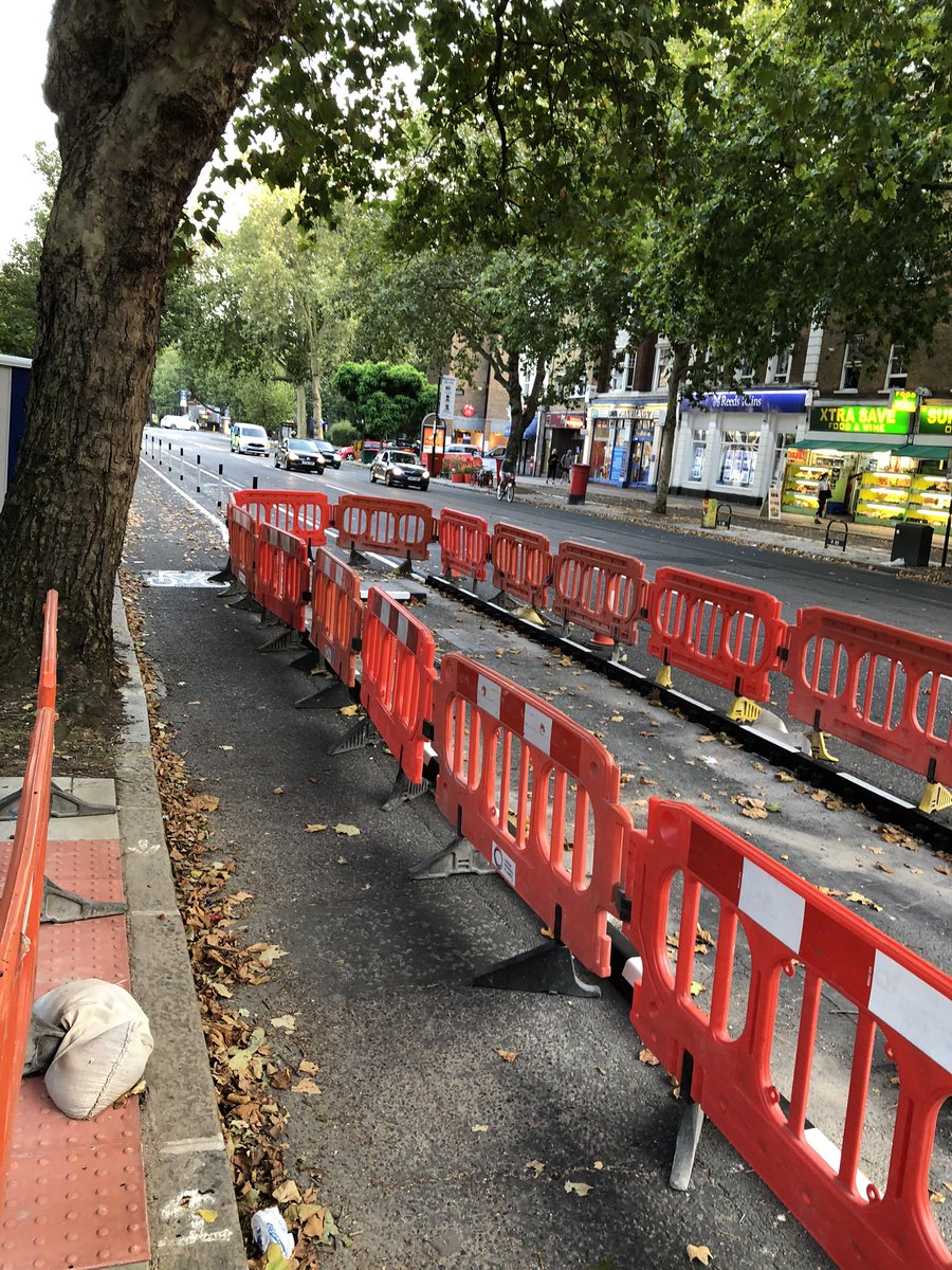 This is exciting - looks like a bus stop cycle bypass going in on Kennington Road