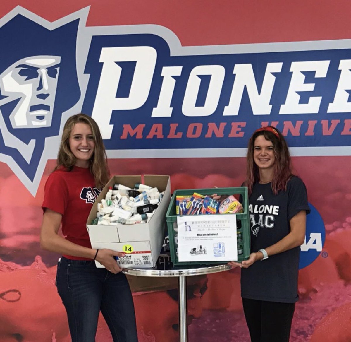 Malone_SAAC's tweet photo. Co-Presidents Christina Williams and Abby Reynolds took a trip to the Refuge of Hope! They delivered boxes of toiletries that Malone SAAC collected this past year. We love supporting the shelter and we couldn’t do it without all your help! https://t.co/WGNv4Yu0cy