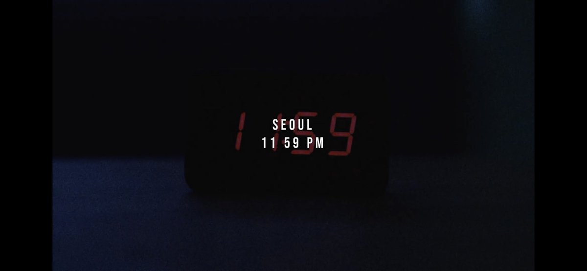 we are then shown a clock about to strike 12mn KST. each of the timezones that follow show the equivalent time to 11:59pm in KoreaThe first location is Seoul, where BBC and Loona is based.