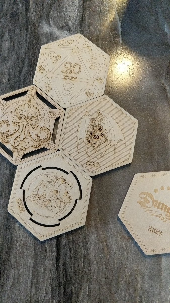 SNikolejsin's tweet photo. Happy #WyrmwoodWednesday everyone!  I got a gift of coasters in the mail today and can't wait to use them during next DnD session ❤️ @WyrmwoodGaming https://t.co/eY0lCTI3y1