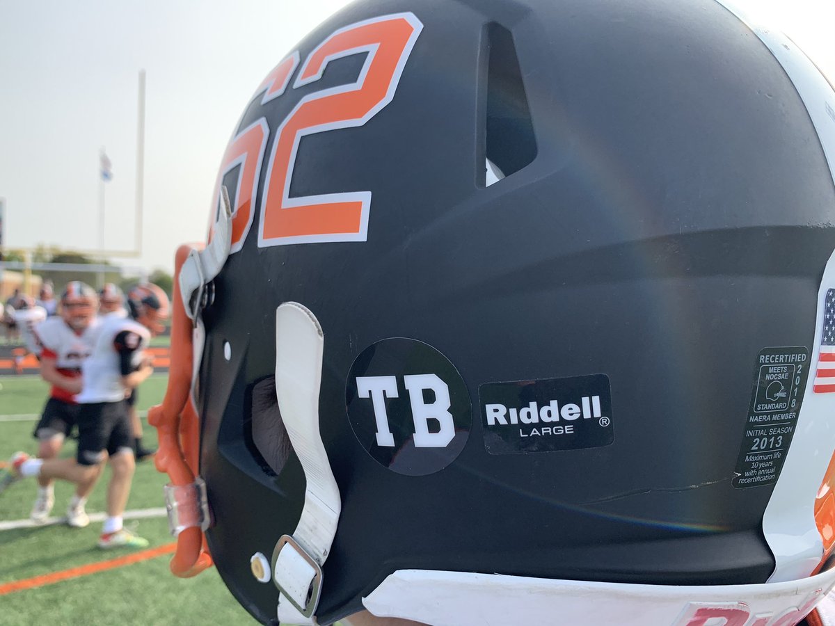 Nate_WekSDPB's tweet image. The Huron Tiger have the initials of longtime coach Tom Baszler, who passed away in April, on their helmets this season.