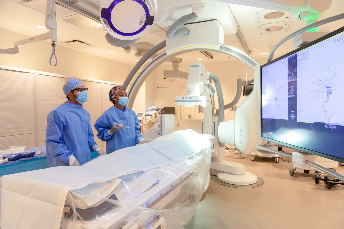 Best IR team with "attending" <a href="/CBoonie_nanoIR/">Christine Boone, MD, PhD</a> and "patient" <a href="/JulieAnMD/">Julie An</a>! Happy to help showcase one of our beautiful IR suites where the magic happens for our patients <a href="/UCSDImaging/">UCSD Imaging</a> every day. So lucky we get to call this our office! <a href="/UCSDRadRes/">UCSDRadRes</a> #radres #futureradres #IRadRes