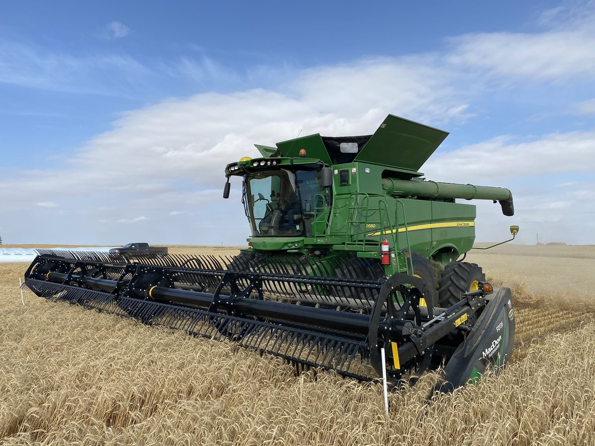 Might have made a mistake. Let my wife in the combine and she seems to enjoy it!  Combining wheat down at her home ground in Lone Rock Sask!  Nice to see sone sun!!