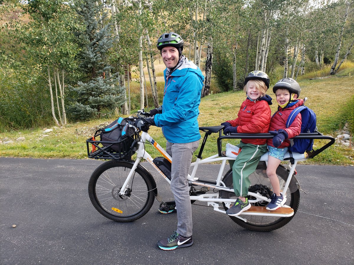 Jordan_D_Jones's tweet photo. School dropoff sustainability. The more I learn about ebikes the more I like: - so efficient its manufacturing CO2 is covered after 600 miles - possibly less CO2 than a meat diet powered rider - negligible CO2 relative to driving #sustainability #ebike #radbike #climatechange https://t.co/73grej2PE7
