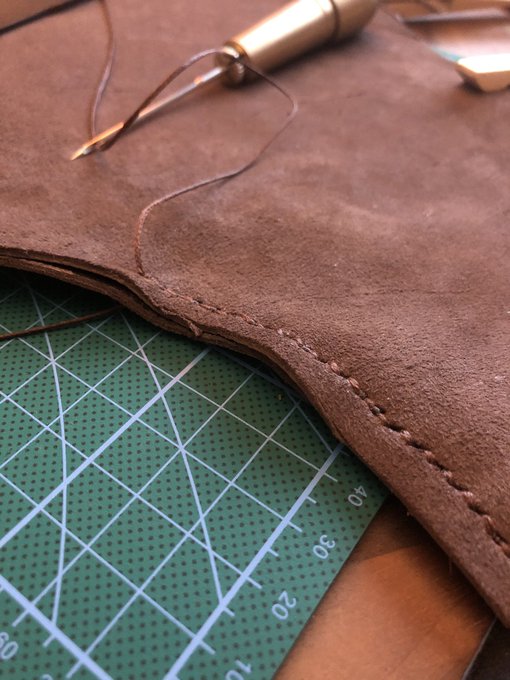 2 pic. Excited to finish this project. Hand stitched hood in chocolate brown goat leather. https://t