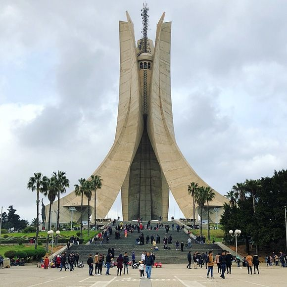 We might also consider the Monument to the Martyr (مقام الشهيد, built for the 20th anniversary of Algerian independence in 1982