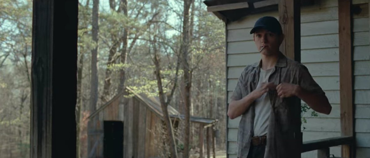 A thread of parallels between Willard Russell (Bill Skarsgård) and Arvin Russell (Tom Holland), in The Devil All The Time (2020).