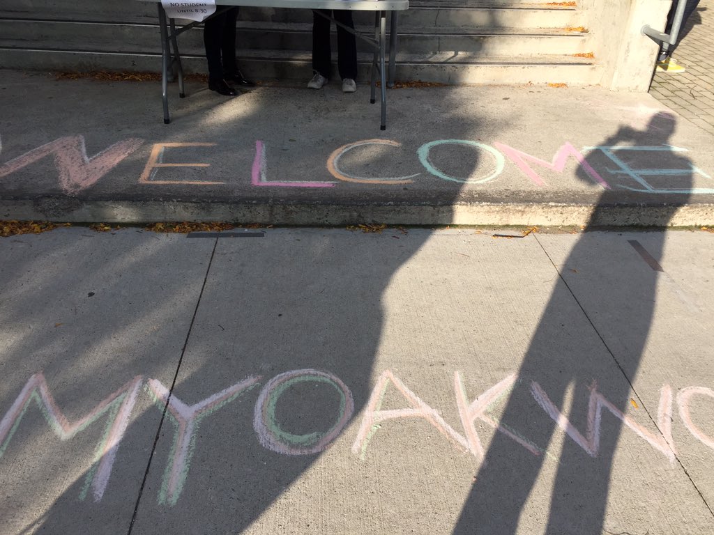 STEMified's tweet photo. Students eagerly awaiting the start of school, with their masks and physical distancing, at @TDSB_Oakwood                     The 2020-21 school is different, but welcoming teachers and eager students is constant https://t.co/KstYygnDQD