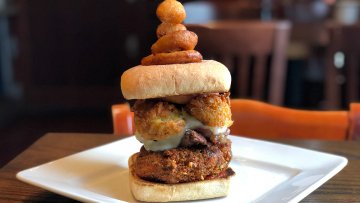 Happy Birthday <a href="/PatrickMahomes/">Patrick Mahomes II</a> !! Come celebrate with The Well's Mahomes Sandwich – a tower of fried mac ‘n’ cheese, grilled ribeye, Swiss, house-made jumbo tater tots, crispy onion rings and cheese curds on a ciabatta bun with Sriracha ketchup. #WellThatWasFun