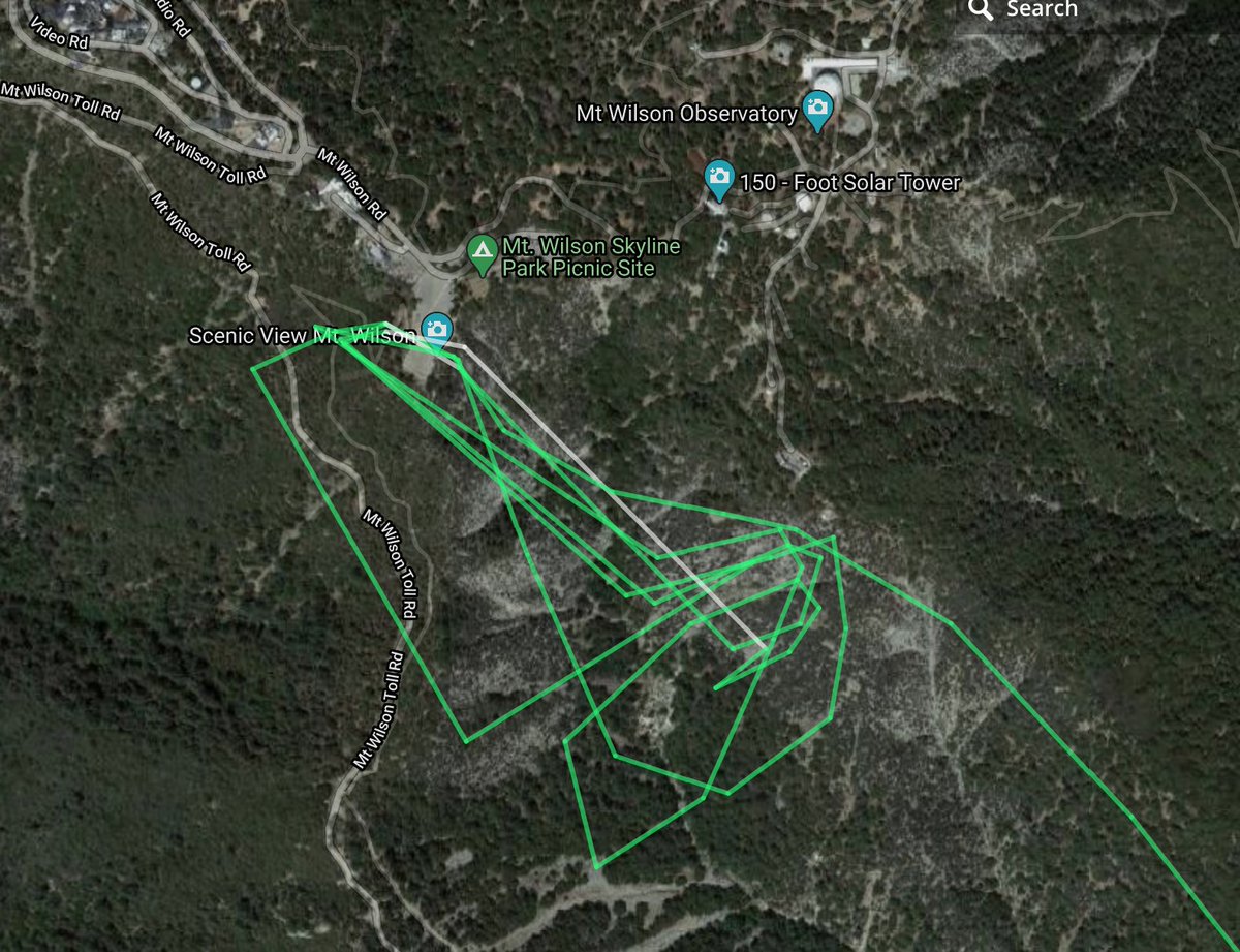 A helicopter was slurping up water from the parking lot tank and dropping it on a spot at Mt. Wilson Observatory.View to the South from Mount Wilson Cams and Flight radar path of a helicopter.  #bobcatfire