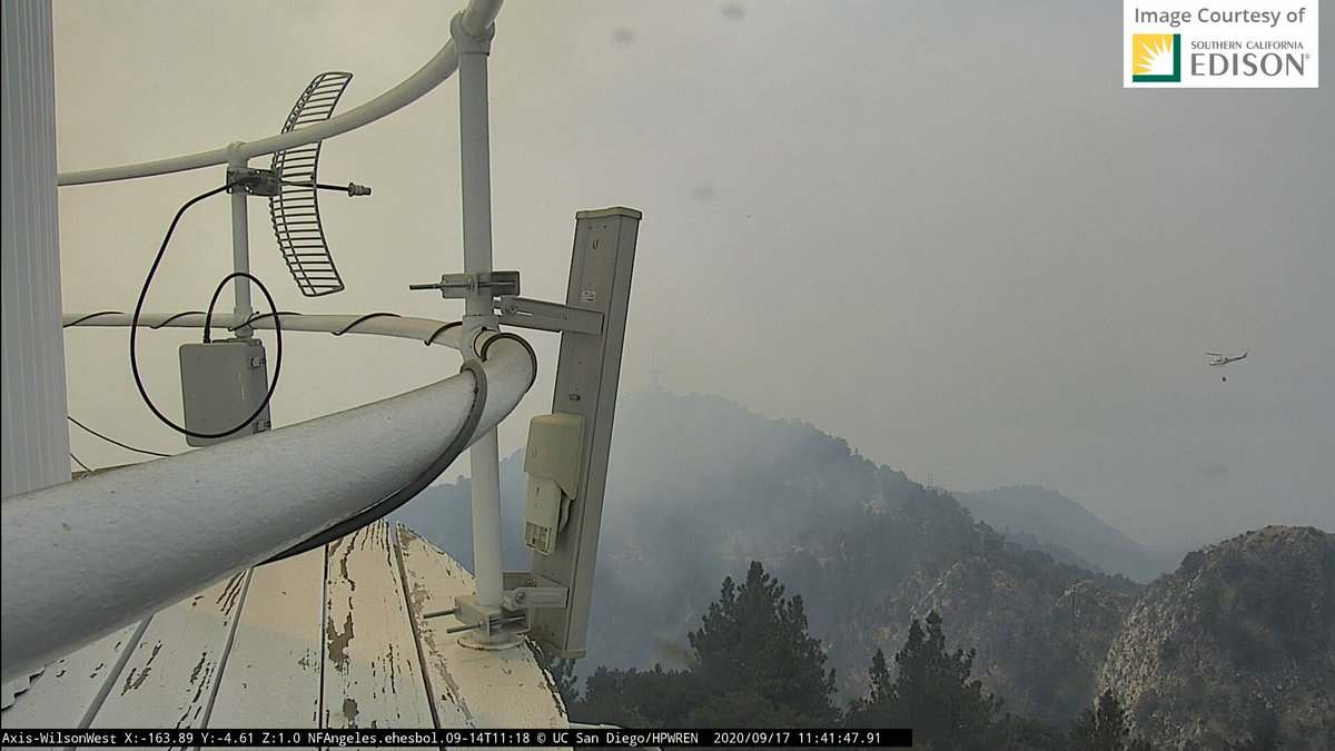 I am alternating between these two camera views. 15 minute timelapses give a picture of  #BobcatFire at Mt. Wilson.EAST:  http://www.alertwildfire.org/orangecoca/?camera=Axis-WilsonEastWEST:  http://www.alertwildfire.org/orangecoca/?camera=Axis-WilsonWestThese stills of the helicopter parking lot and water placement over the last hour are from WilsonWEST.