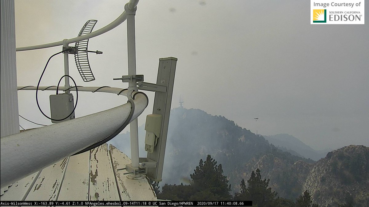 I am alternating between these two camera views. 15 minute timelapses give a picture of  #BobcatFire at Mt. Wilson.EAST:  http://www.alertwildfire.org/orangecoca/?camera=Axis-WilsonEastWEST:  http://www.alertwildfire.org/orangecoca/?camera=Axis-WilsonWestThese stills of the helicopter parking lot and water placement over the last hour are from WilsonWEST.