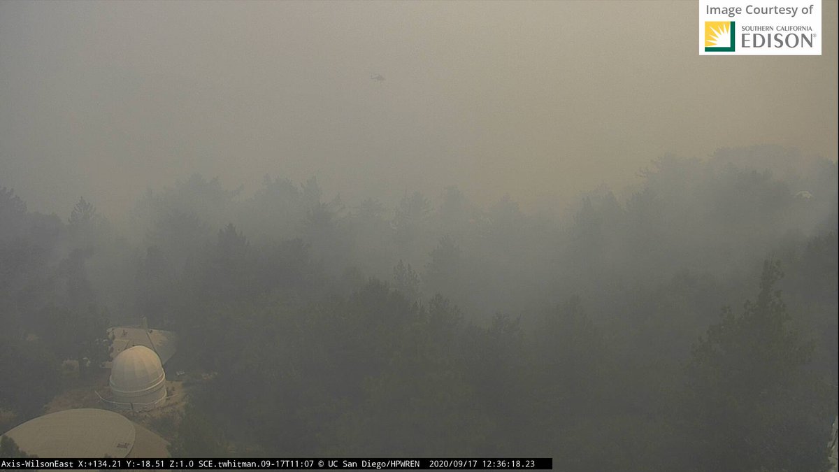 Minutes ago on Mt. Wilson from the  #AlertFire cameras I mentioned upthread:East Cam you can see chopper top center.West Cam (2 views): Chopper heading to parking lot, and back for a water dump #bobcatfire