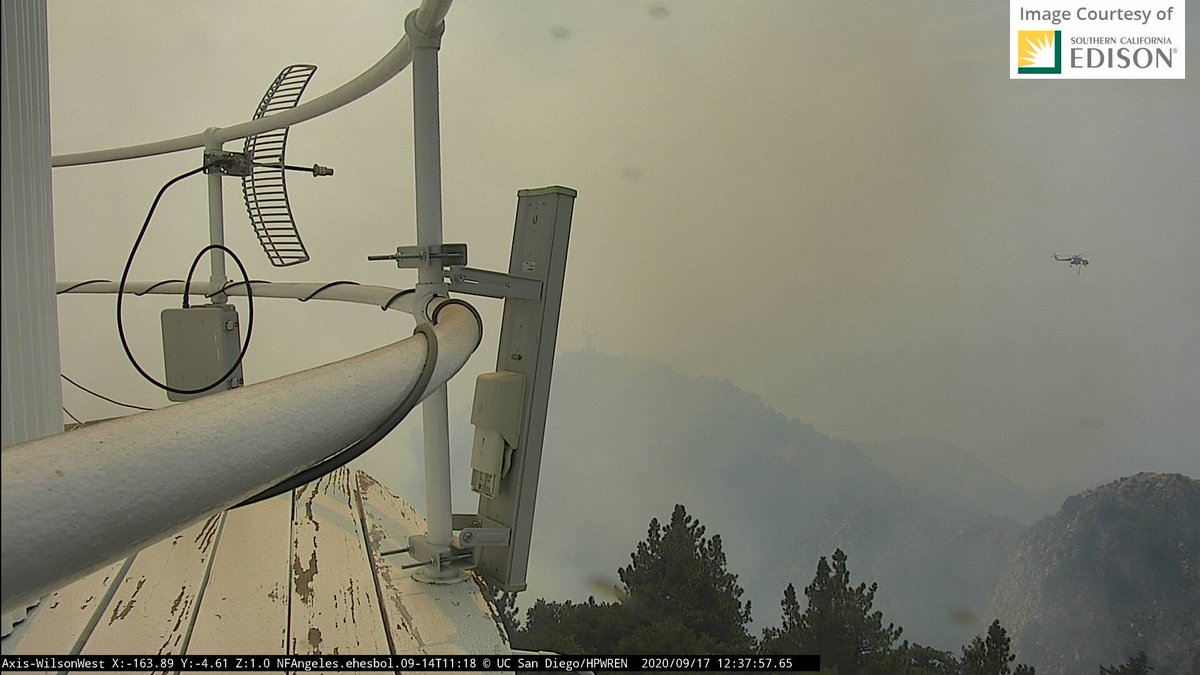 Minutes ago on Mt. Wilson from the  #AlertFire cameras I mentioned upthread:East Cam you can see chopper top center.West Cam (2 views): Chopper heading to parking lot, and back for a water dump #bobcatfire