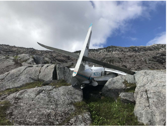 The Probable Cause of this crash was the pilot’s decision to fly under visual flight rules into instrument meteorological conditions aka “VFR into IMC”.  This is a closer view of the aircraft - the floats were sheared off during impact. (Both photos via NTSB.) /2