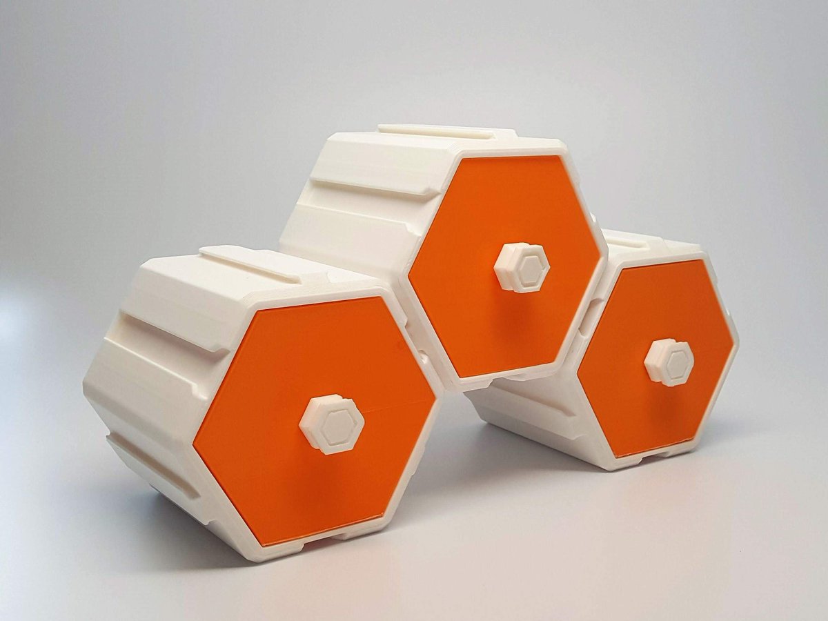 O3D_Official's tweet photo. The HIVE Evo - a modular drawer system, printed in @Polymaker_3D PolyLite white PLA and @esun3dfilament
 orange PLA Pro. Get it on @Cults3D

3D Model: https://t.co/uTyH66VskJ

#3DPrint #printable #3DModel https://t.co/iHwhkss9ID