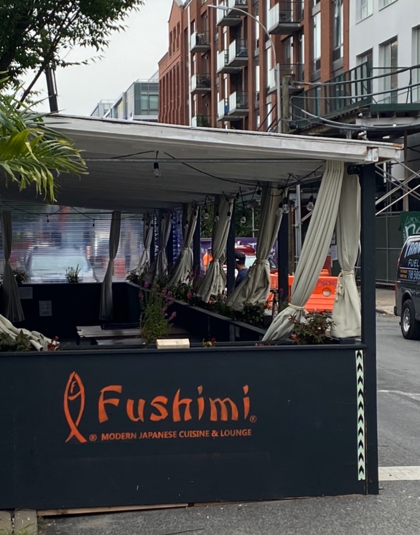 This is another take on the ‘when is outdoor dining no longer outdoors’ debate. Fushimi, in Williamsburg, installing corrugated plastic paneling on three sides of their corral. Sensing a ton of urgency on the part of restaurants as nighttime temps fall.