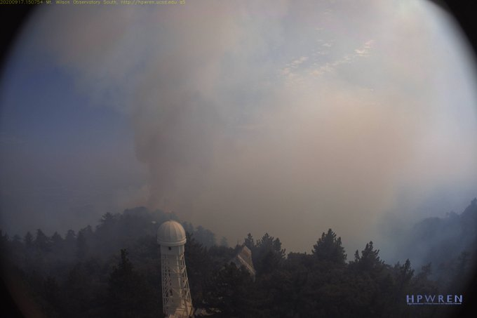  @Thomas_Connor: It's not clear with all the smoke, but that looks like flames directly visible just above the 60ft. Solar Tower up on  #MtWilson. Gone in the next few images (1 every minute), so it looks like the crews up there are fighting hard.  #BobcatFire