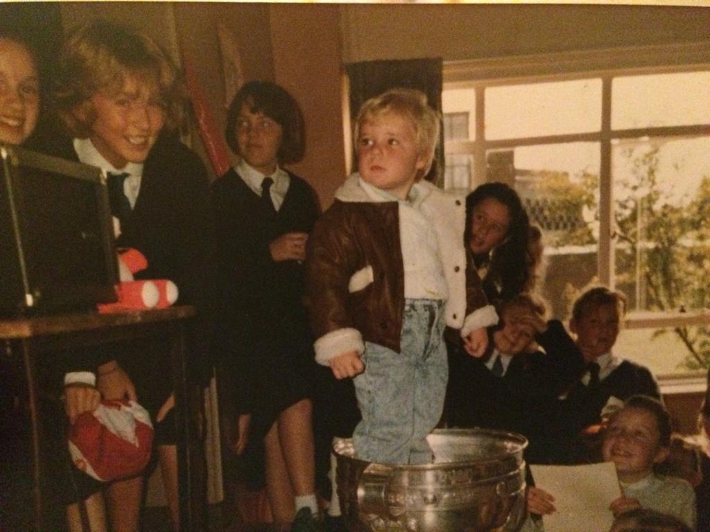 PeterMcNamara_'s tweet photo. Late to the party, but one of my uncles dug out this pic of myself standing in Sam Maguire at my sisters' primary school in Ballyphehane after @OfficialCorkGAA completed the double in 1990. #Cork #CorkDouble #Rebelsabú #goredforCork https://t.co/3D4IkeotDF