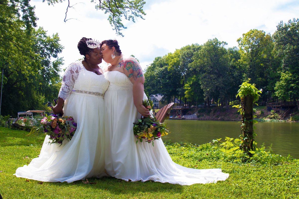 mechanicfemme's tweet image. And join they did. Over 10,000 people celebrated with us, cheered us on, and cried as we walked in our @davidsbridal wedding gowns, white @BIRKENSTOCKUSA sandals holding flower bouquets towards the White River alone, but surrounded by the greatest love we could ask for.